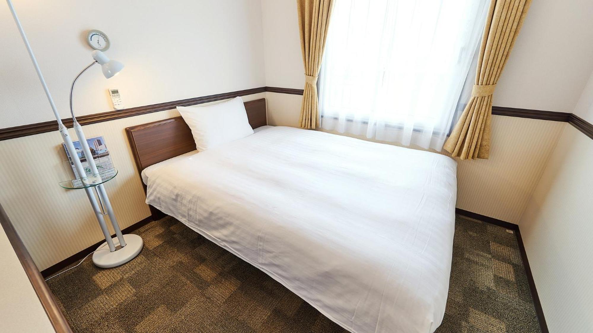 Toyoko Inn Tsushima Izuhara Номер фото
